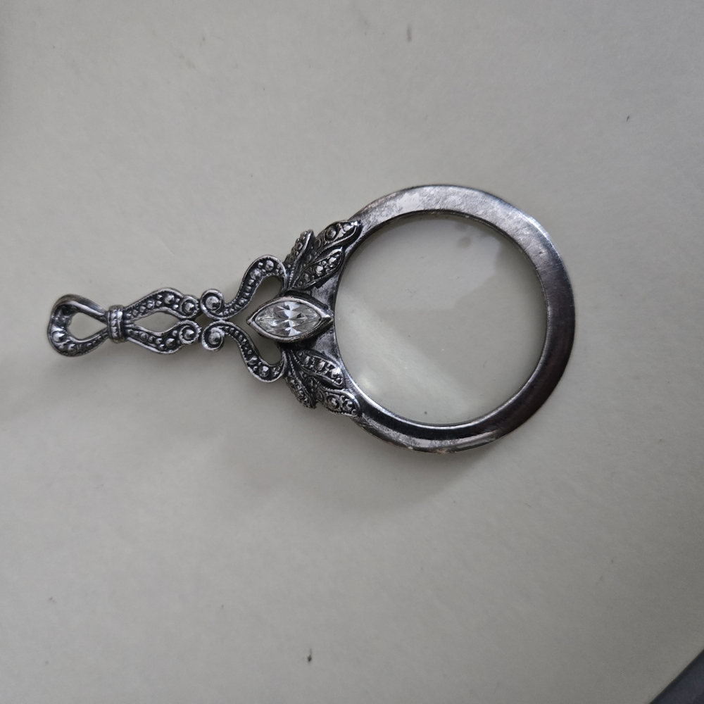 Elegant Silver Magnifying Glass Pendant